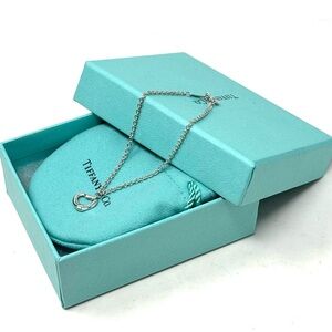 Authentic Tiffany & Co. Elsa Peretti Single Small Open Heart Charm Bracelet.